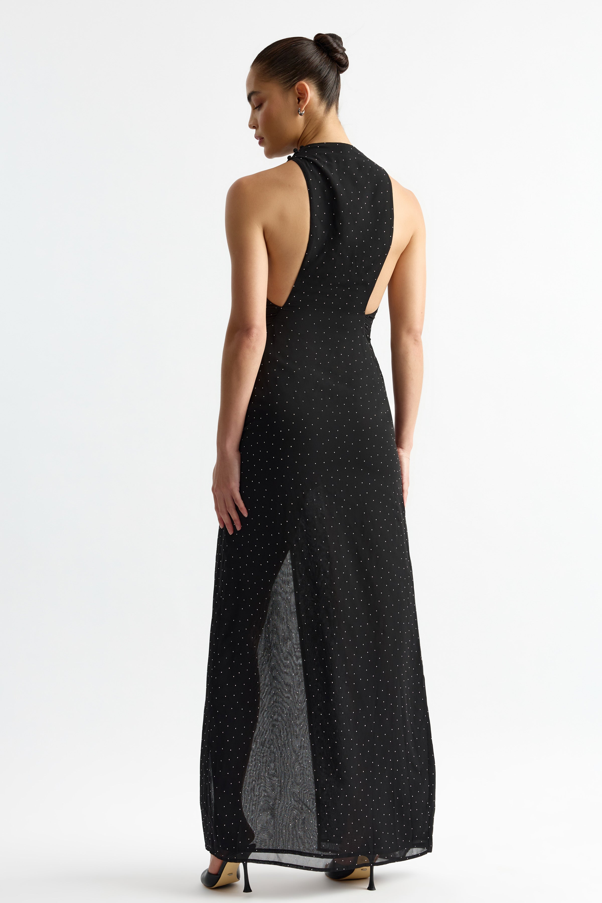 Rachelle Dress featuring a backless silhouette with subtle sparkle detail in black for formal and evening occasions by Studio Lexi