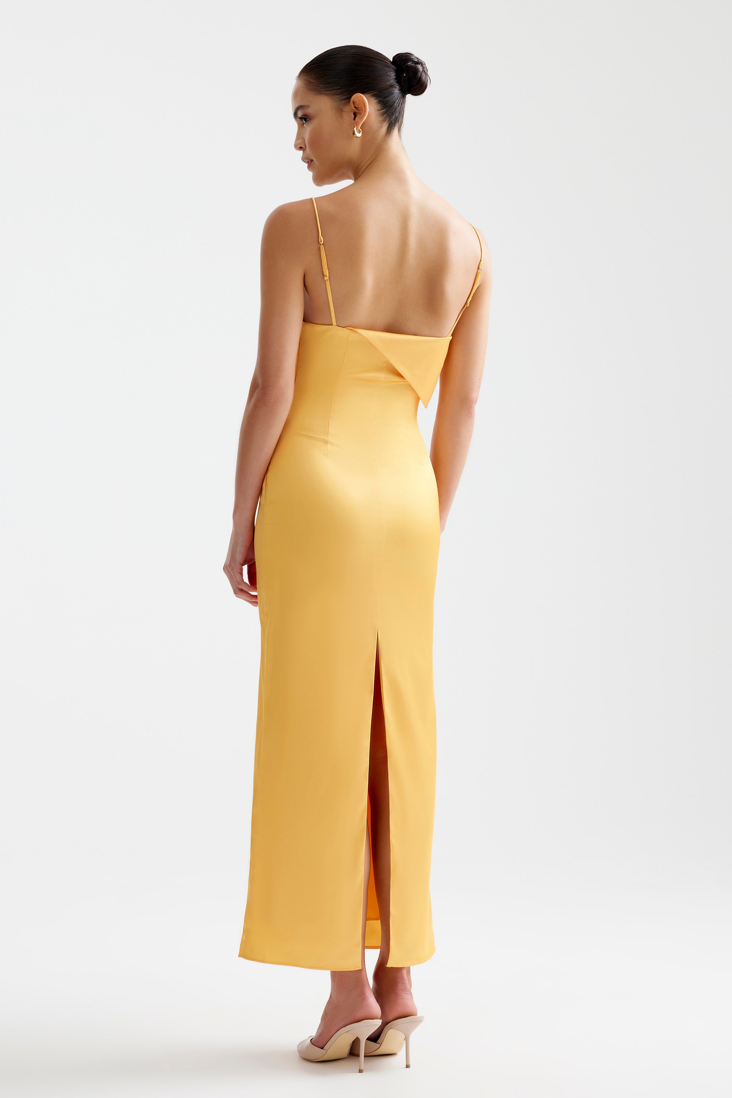 Rayna Dress featuring a bra-friendly fit with adjustable straps and a split back in vibrant papaya for formal occasions