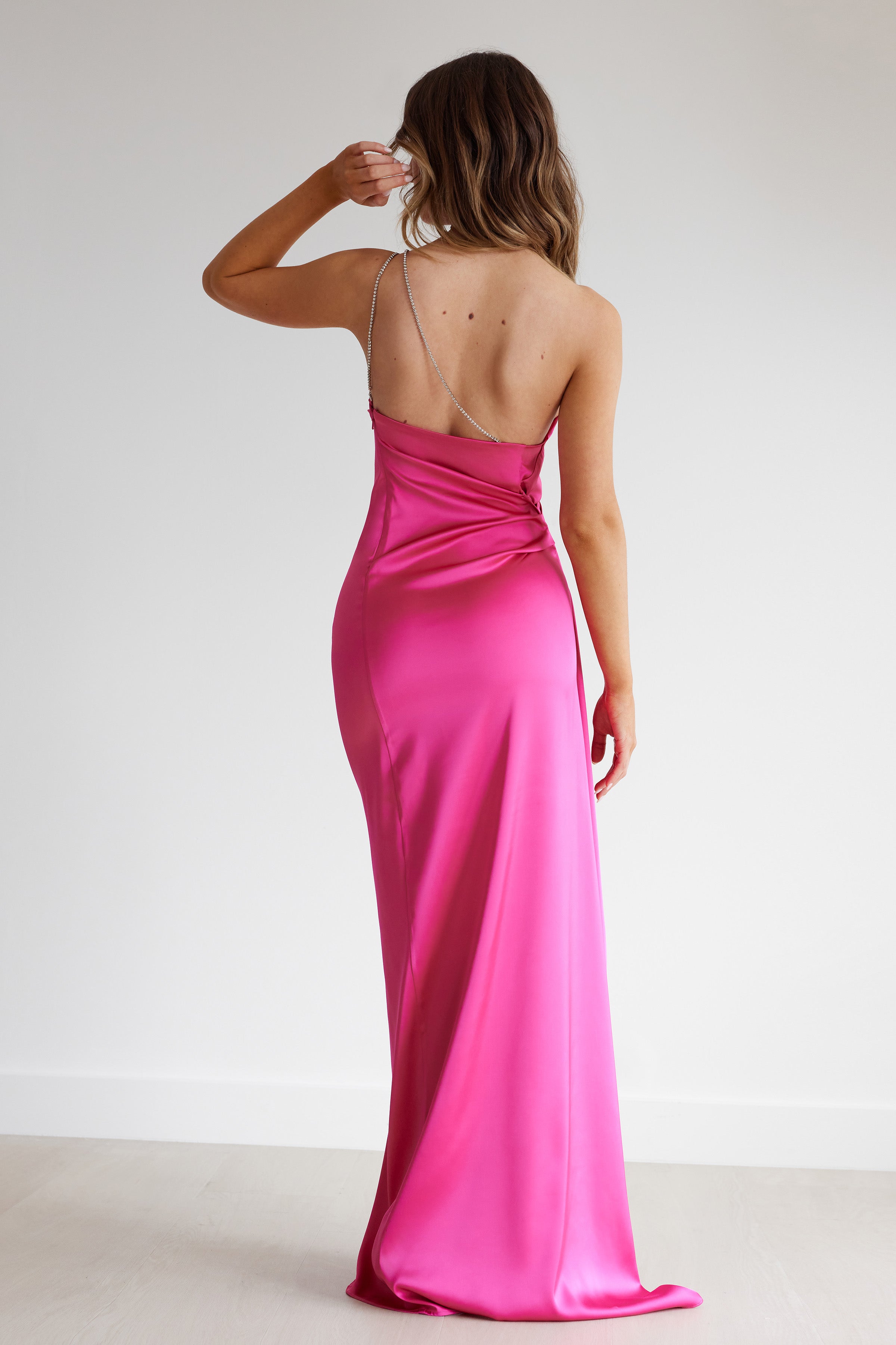 Samira Dress featuring a pink satin backless design with a diamante strap and small train for formal occasions