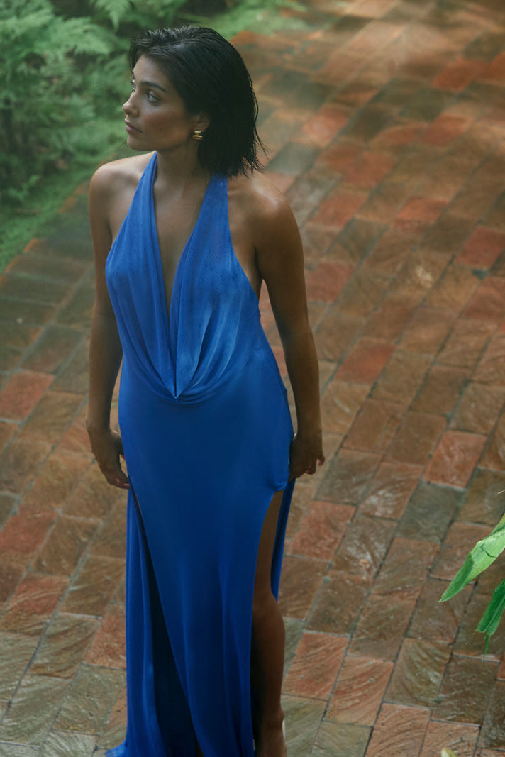 Savannah Dress deep V neckline with halter style and side split in vibrant blue for formal and wedding guest occasions