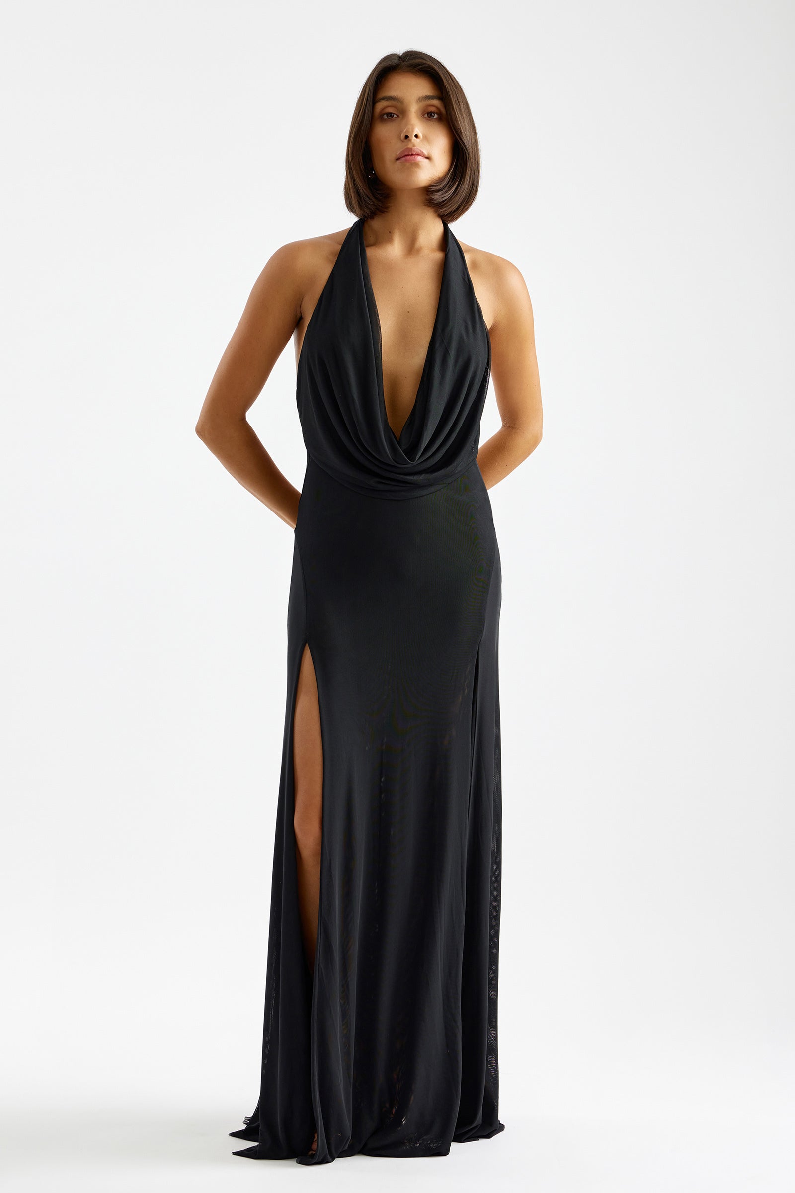 Savannah Dress with backless halter neckline and thigh-high split in black for formal and black tie events by Studio Lexi