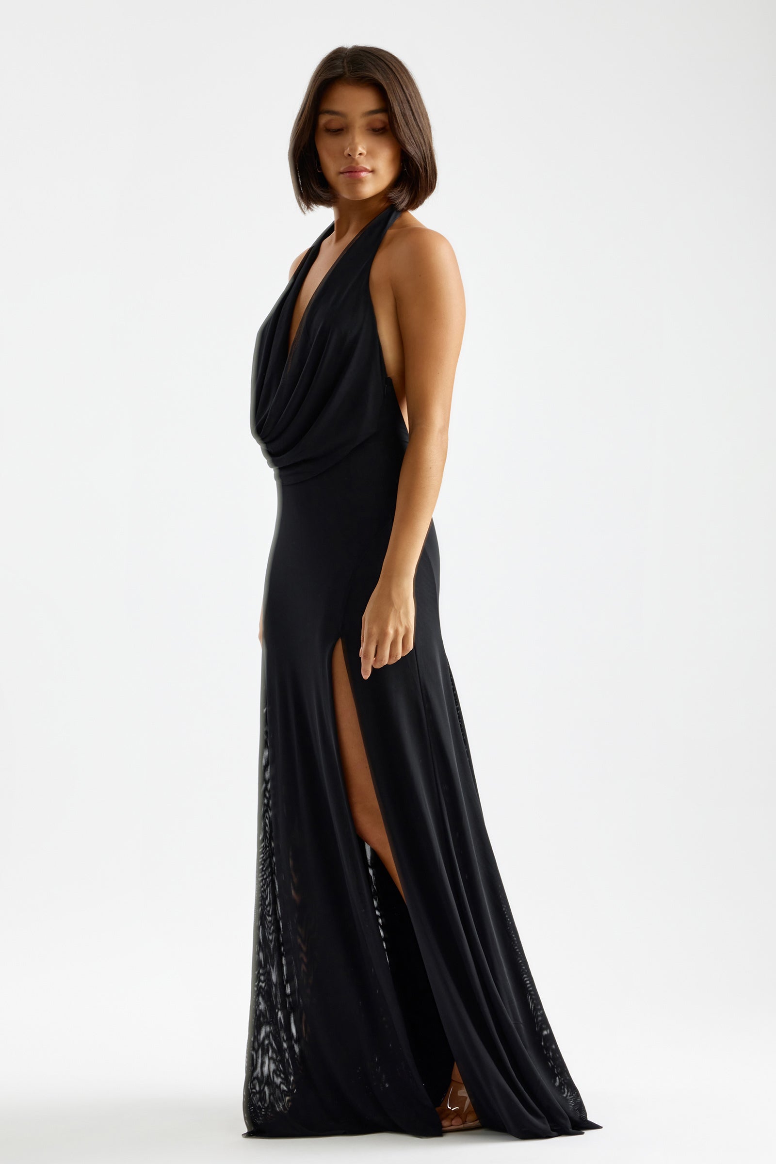 Savannah Dress halter neckline with draped front and high split in black for formal black tie and evening by Studio Lexi