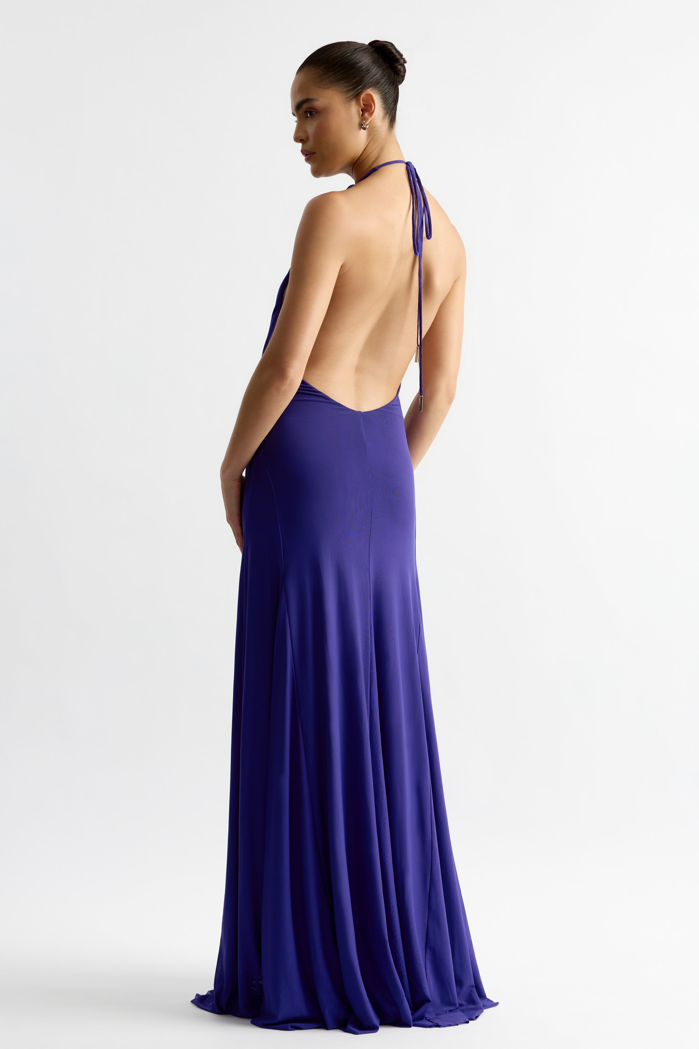 Savannah Dress - Indigo backless halter gown in portrait orientation, gallery position 5, flowing full-length skirt