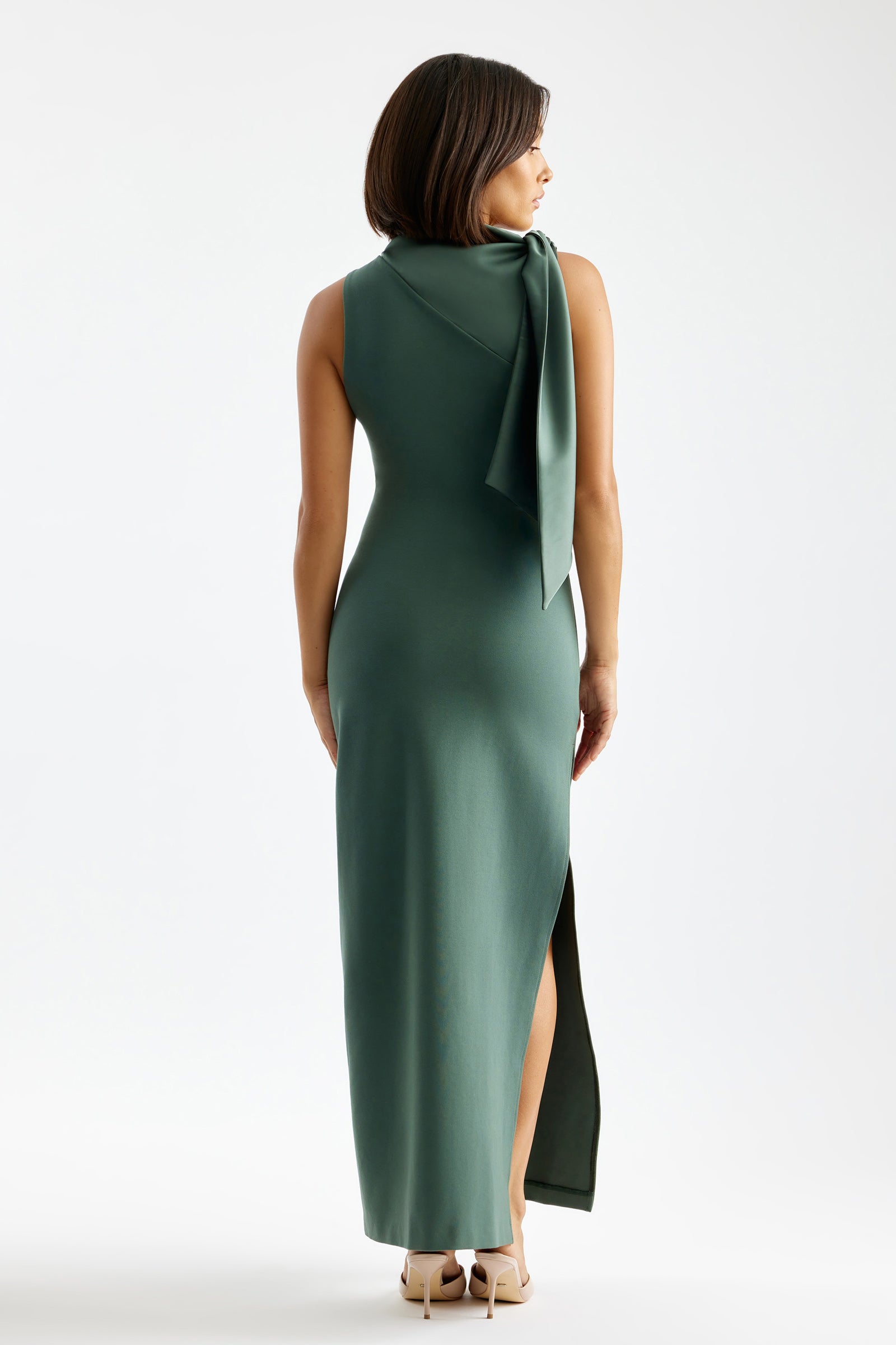 Shilo Dress sleeveless fitted design with back bow and side split in army green for formal and wedding occasions by Studio Lexi