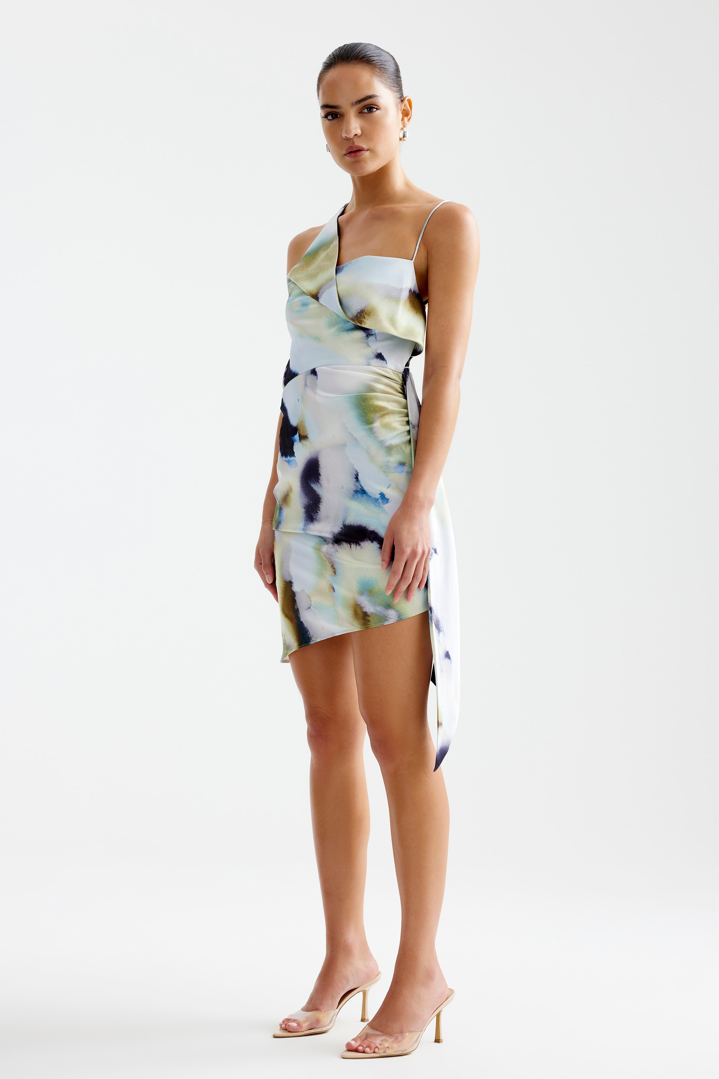 Sophie Dress featuring a draped asymmetric design with a blue mineral print for party and cocktail occasions by Studio Lexi