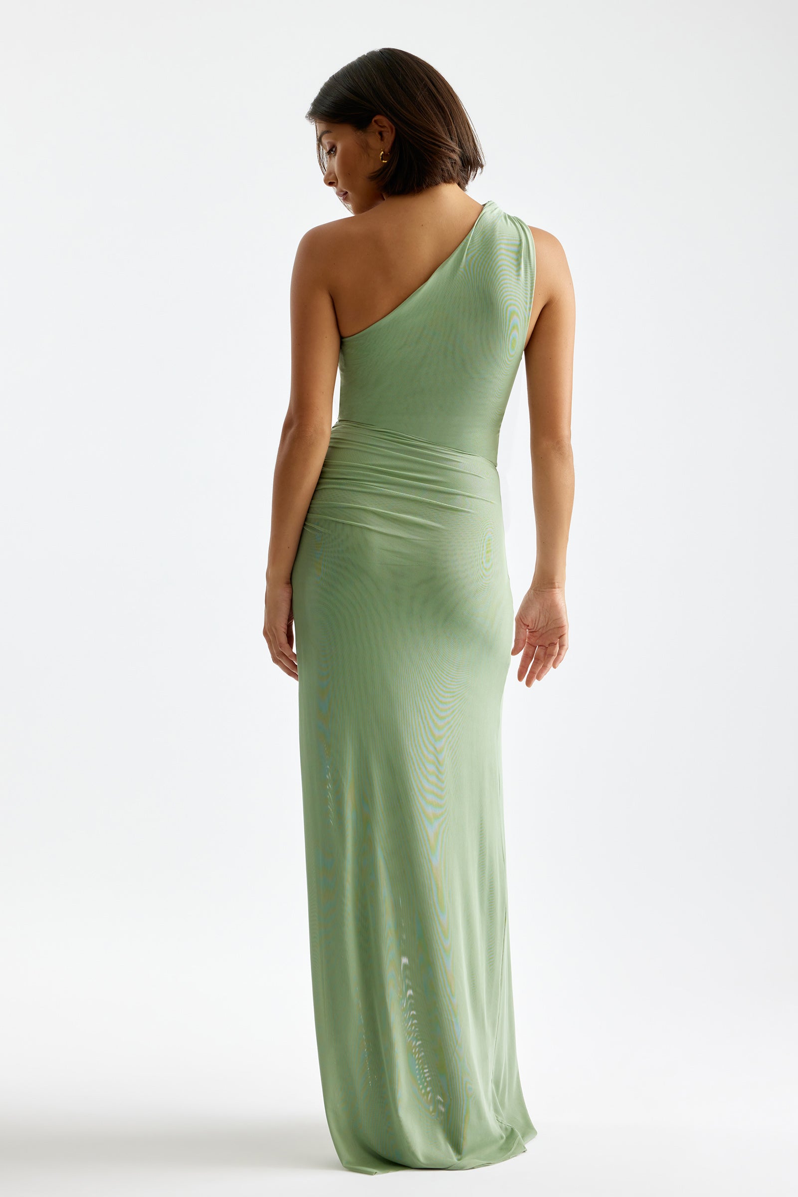 Viola Dress one-shoulder design with ruched waist and backless detail in soft sage for formal and party occasions by Studio Lexi