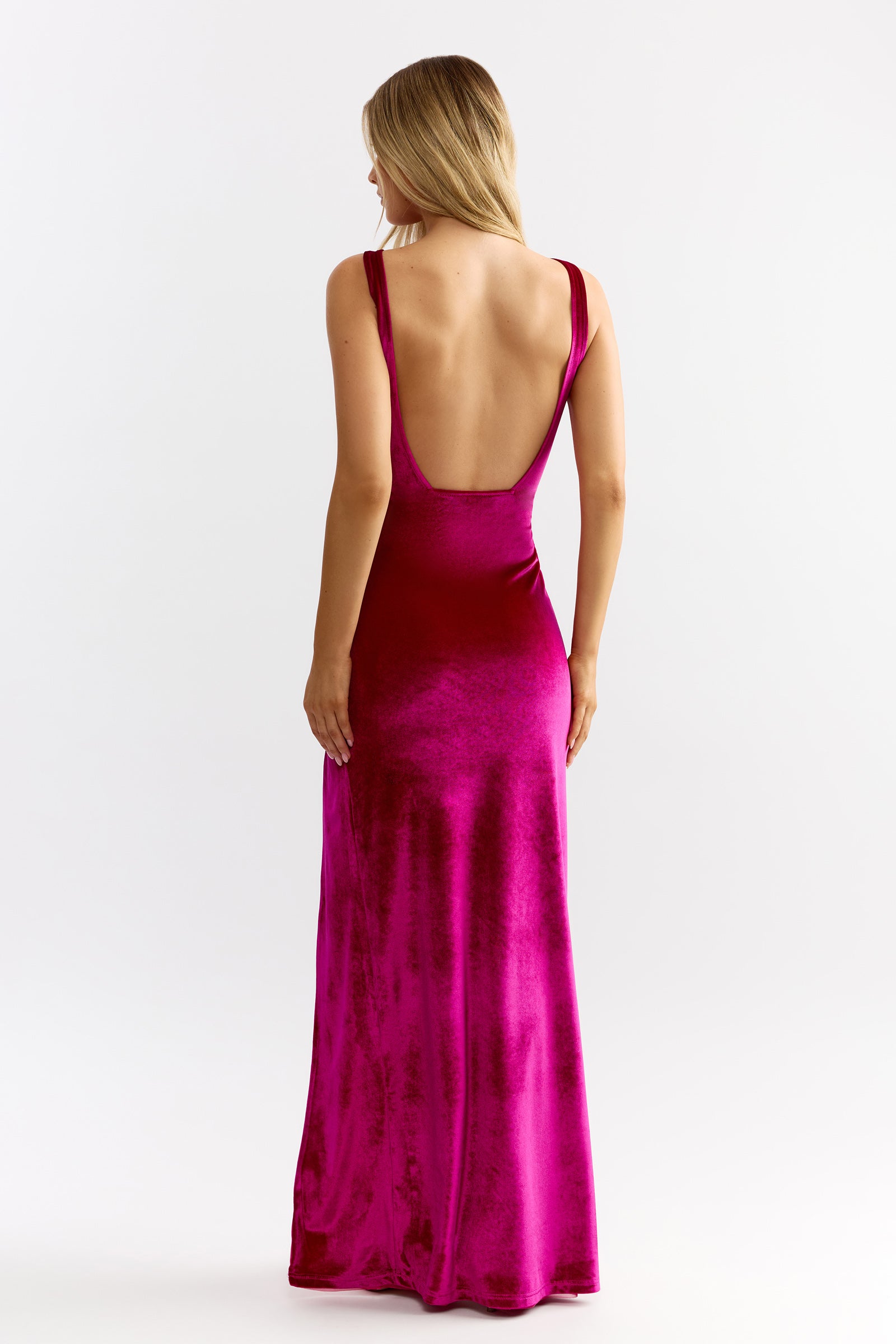 Whitney Dress featuring a backless design in rich berry velvet ideal for formal and black tie events by Studio Lexi