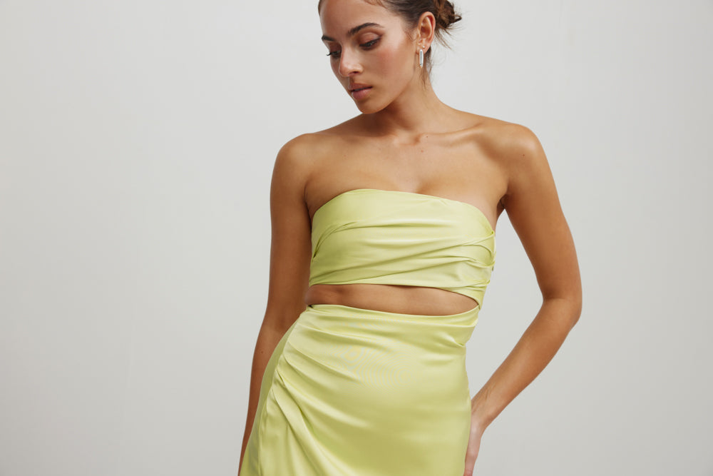 Apollo Dress mojito green strapless with cut-out waist and draped detail for elegant formal and wedding guest wear