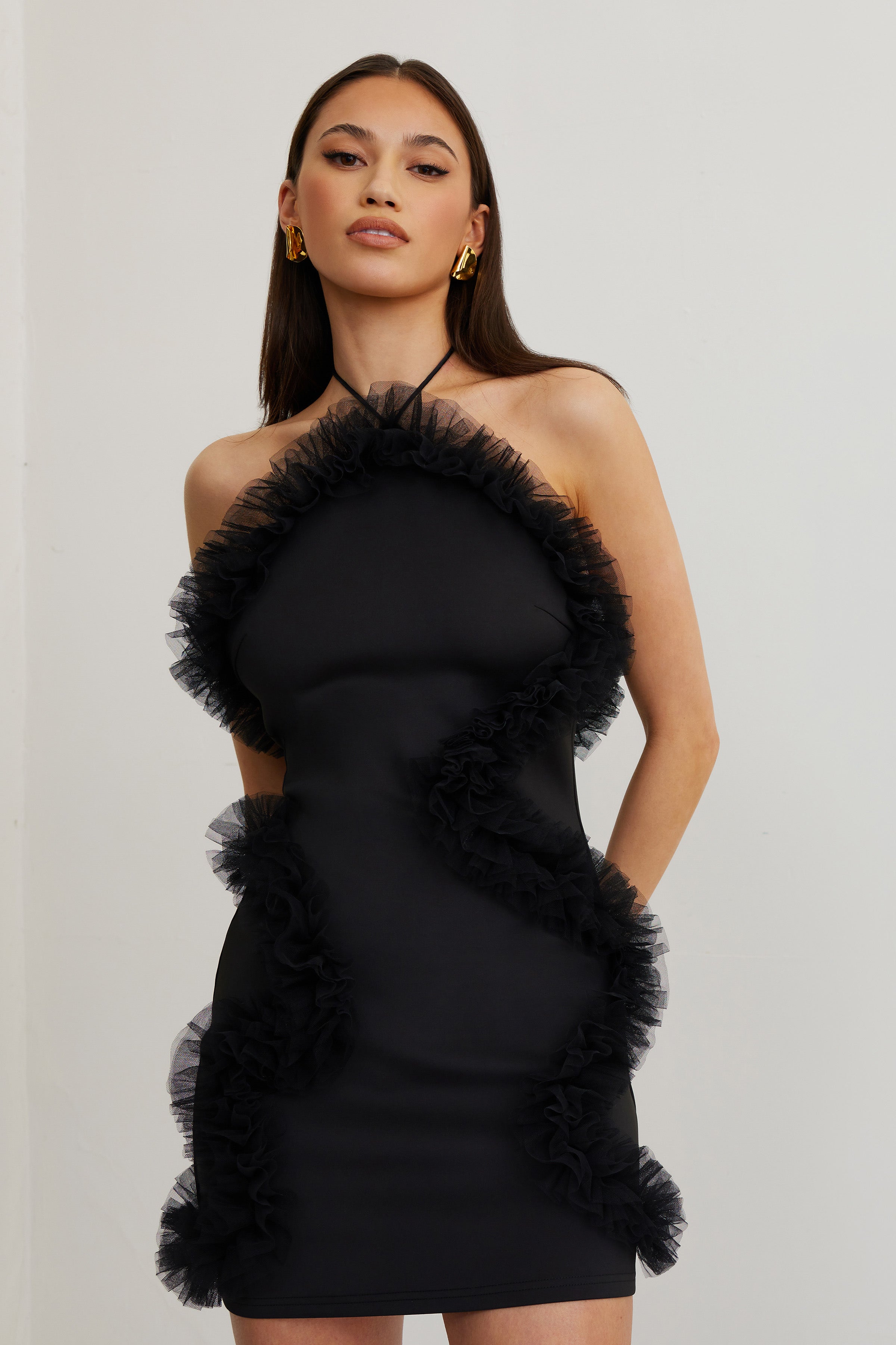 Jewel Dress featuring a black halter neck and ruffled trim in a fitted design for elegant cocktail and party wear