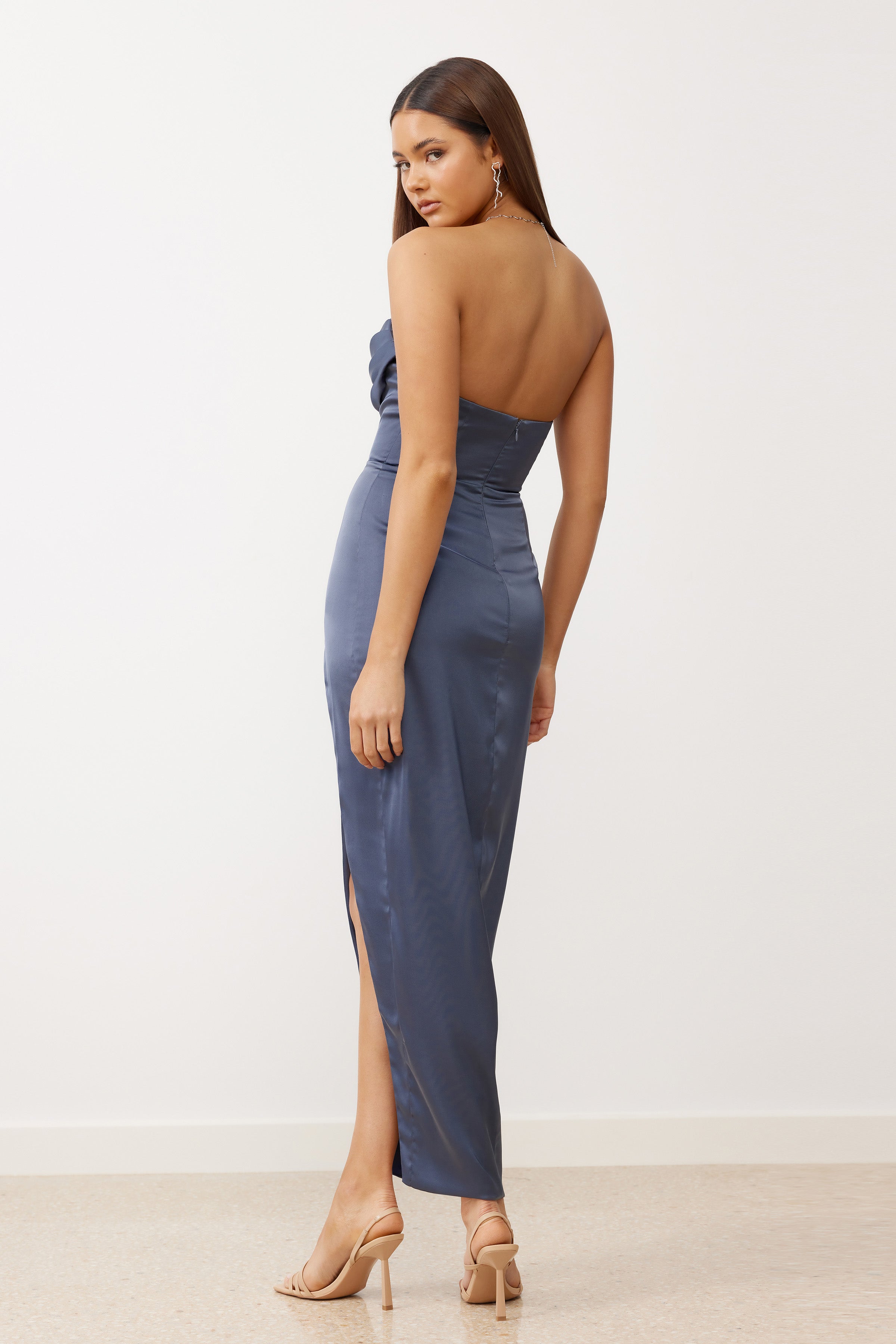 Juliana Dress featuring strapless design with open back and side split in elegant slate satin for formal occasions