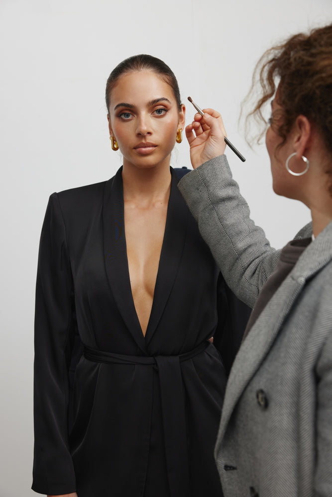 Lucio Jacket Dress featuring a belted waist and deep V neckline in black satin for sophisticated occasion wear