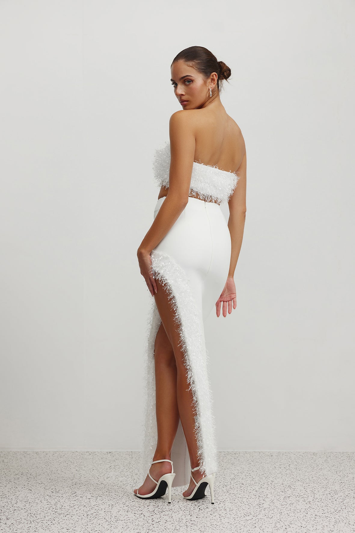 Margarita Set featuring strapless white design with textured trim and high split for formal and party occasions