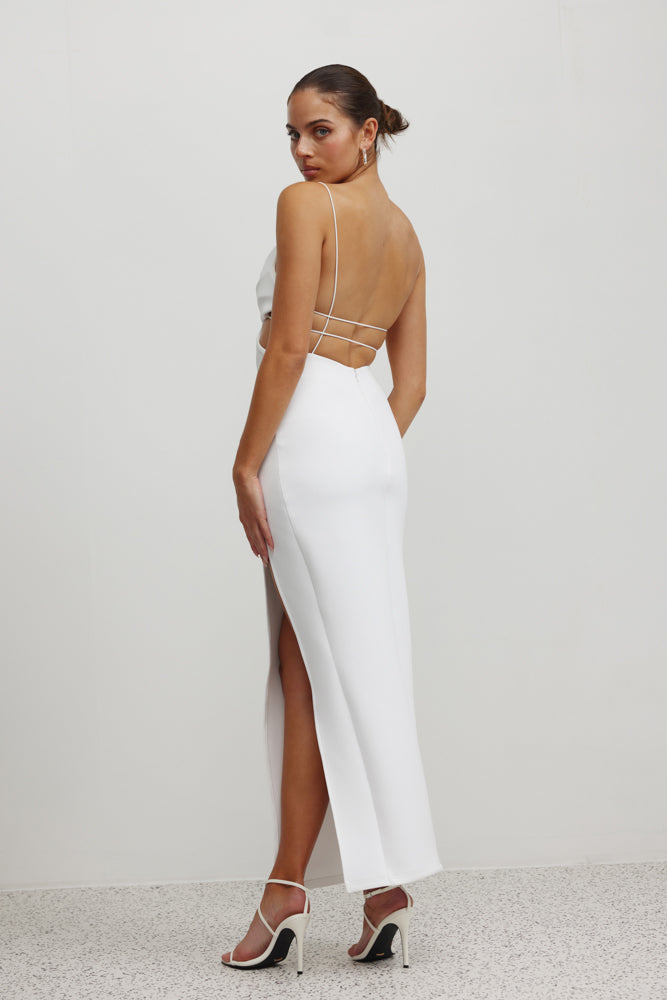 Neptune Dress featuring a backless silhouette, delicate straps, and a high side split in white for formal and cocktail occasions