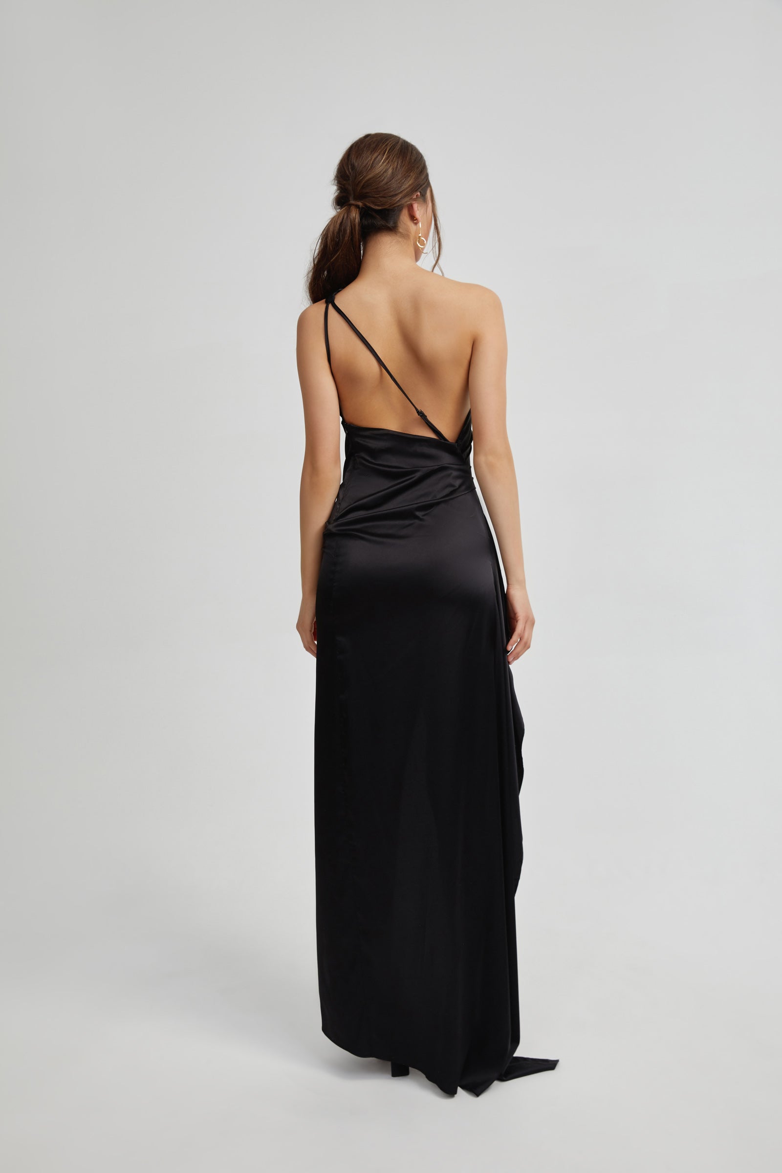 Samira Dress black satin gown with backless one-shoulder strap and sleek floor-length silhouette for formal occasions