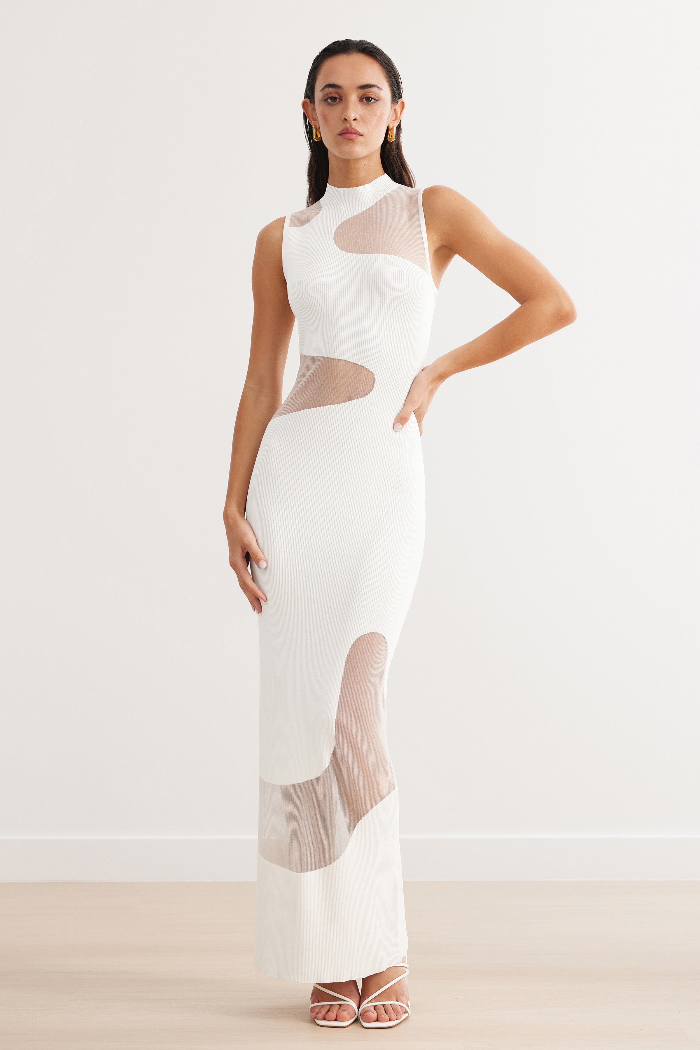 Sierra Dress featuring a sleek high neck design with sheer mesh panels for sophisticated cocktail and party wear in ivory tone